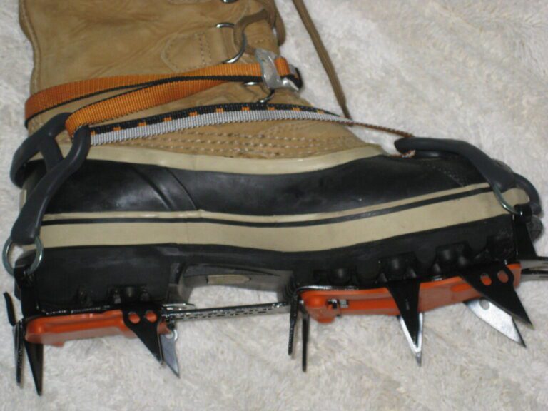 crampons attached to hiking boots