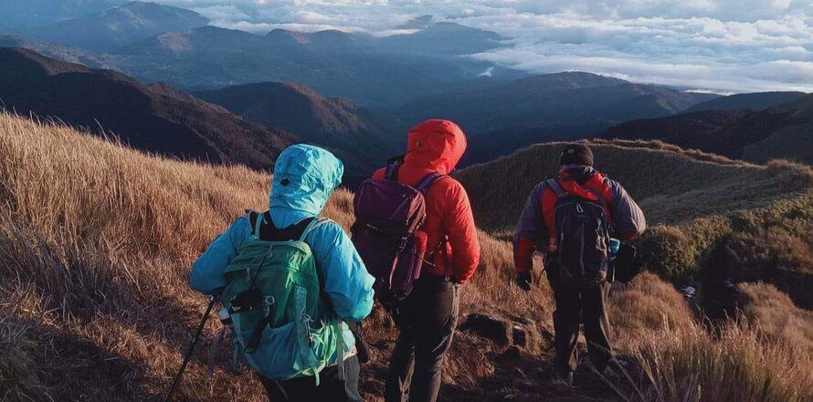 How to Avoid Snakes While Hiking (My Trail-Tested Guide) 3 people hiking at dawn