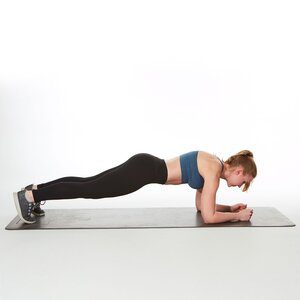 woman doing Forearm Plank with Heel Lifts