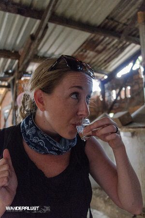 How to Avoid Snakes While Hiking (My Trail-Tested Guide) woman taking liquor shot