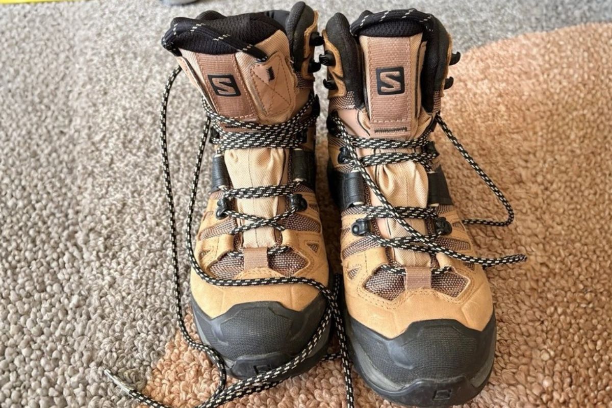 Do You Need Ankle Support for Hiking? (What You Must Know) Pair of mid-cut waterproof hiking boots providing ankle support for rugged hiking trails.