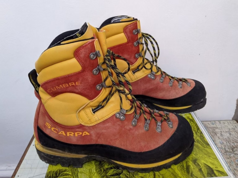 a brand new pair of Scarpa Cumbre mountaineering boots sitting on their box