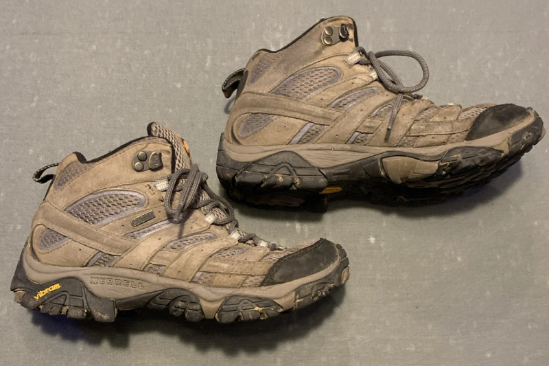 Top 3 Classic Hiking Boots: The Legends That Never Die Worn-out Pair Of Merrell Moab 2 Mid