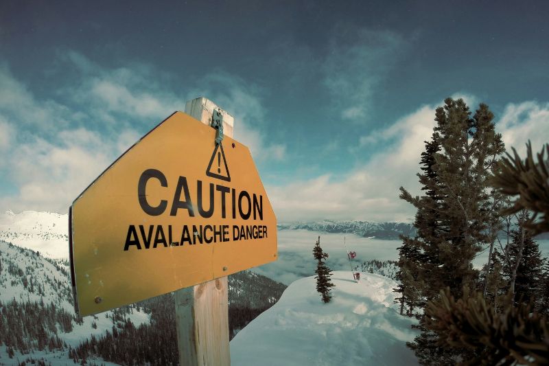 Avalanche Safety Guide: Prepare, Survive & Rescue Caution Avalanche Danger Sign