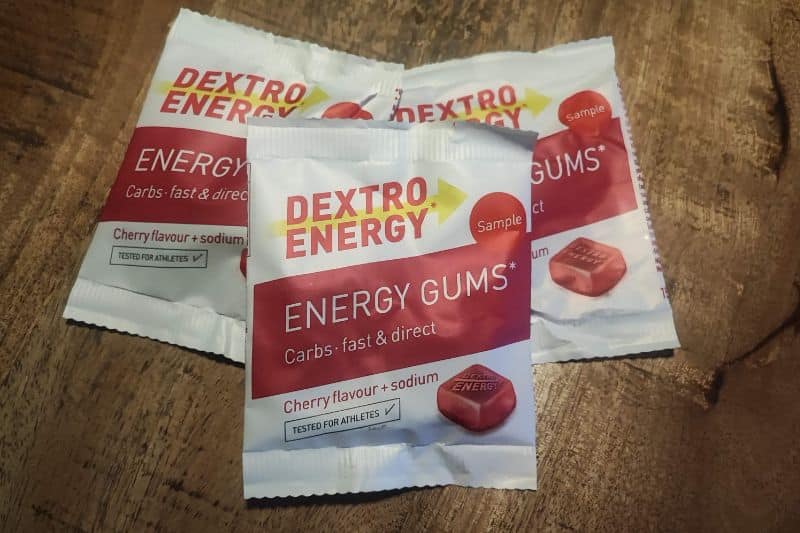 Multi-Day Hiking Nutrition: Expert Tips by Nancy Clark Three packs on Dextro Energy Gums on a table