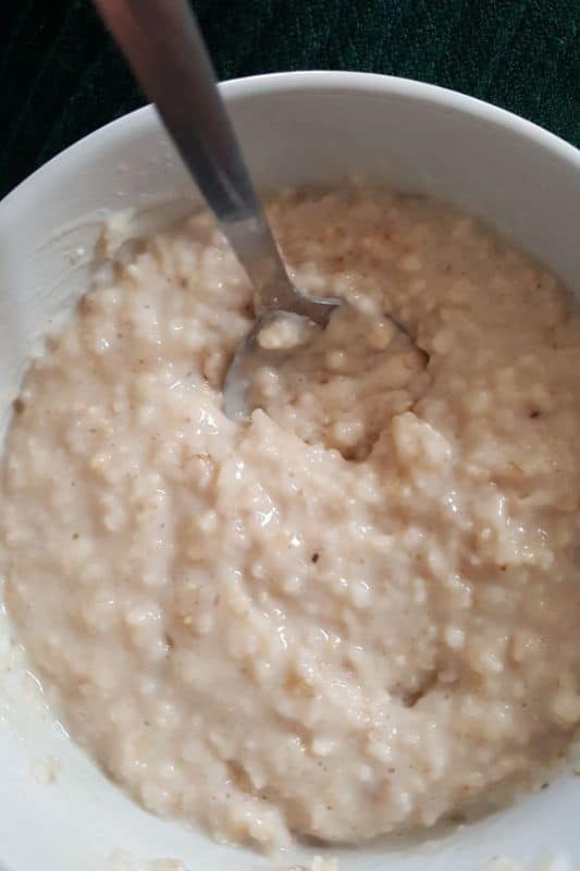 Multi-Day Hiking Nutrition: Expert Tips by Nancy Clark Fresh oatmeeal in a bowl with a spoon in it