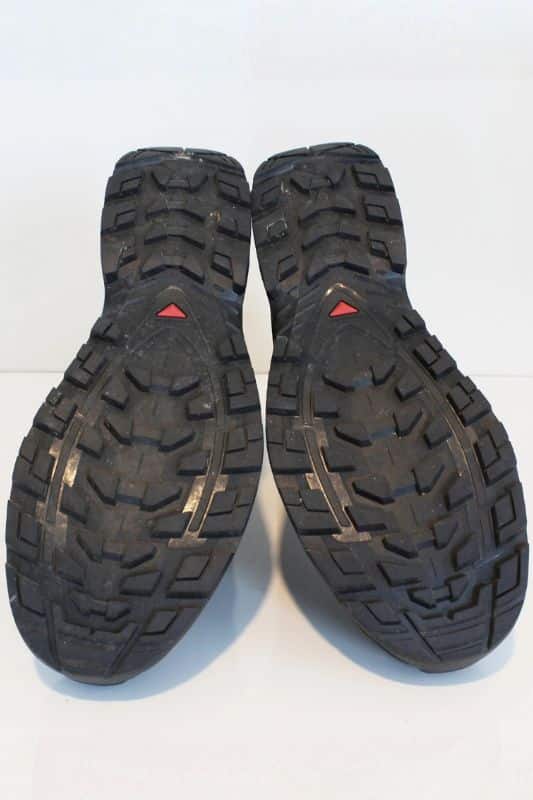 Salomon Quest 5 GTX Review Salomon Quest 5 turned upside down so that you can see the lugs on the bottom
