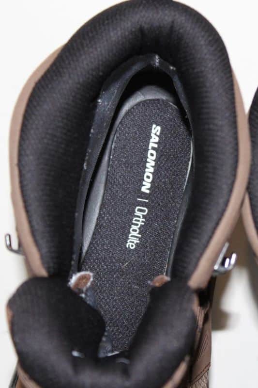 Salomon Quest 5 GTX Review top view of a pair Salomon Quest 5 and inside the shoe the Ortholite insoles are visible