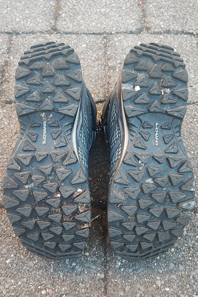 Lowa Innox Pro GTX Mid Review (2026 Test Results) the bottom of a pair of Lowa Innox Pro Mid GTX. The lugs are clearly visible.