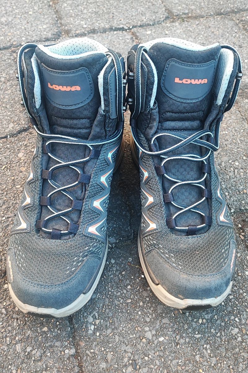 Lowa Innox Pro GTX Mid Review (2026 Test Results) A pair of Lowa Innox Pro Mid GTX seen from the front