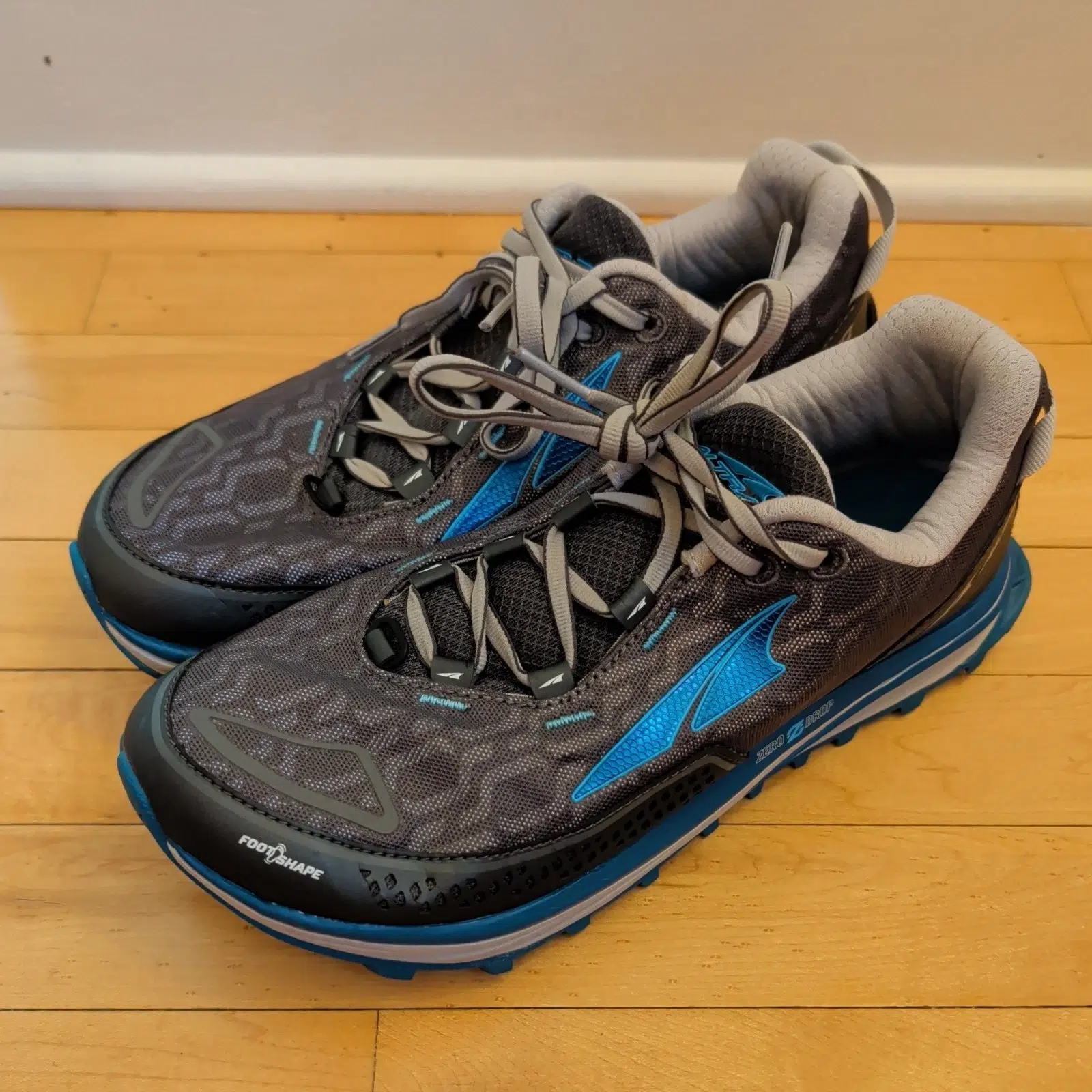 Ankle Strengthening Exercises for Hikers: A 3-Stage Progression Pair of trail running shoes used as a transition from traditional hiking boots