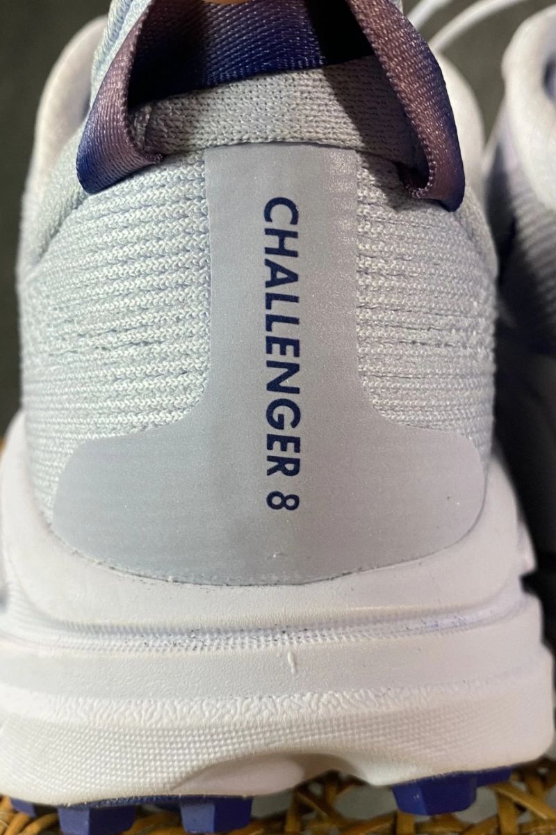 Rear view of the HOKA Challenger 8 showing the padded heel collar and heel counter.