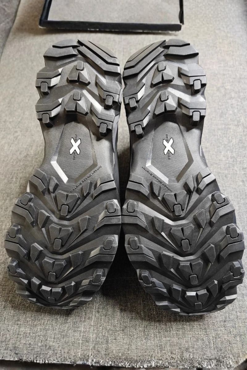 La Sportiva Ultra Raptor 3 Review Outsole of the La Sportiva Ultra Raptor 3 showing deep angular lugs and the aggressive grip pattern for mountain hiking
