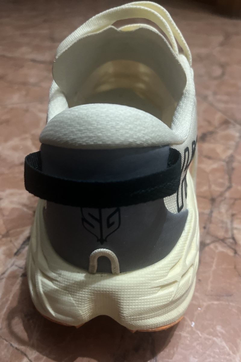 Rear view of the HOKA Speedgoat 7 showing the heel pull tab, refined collar and gaiter attachment loop