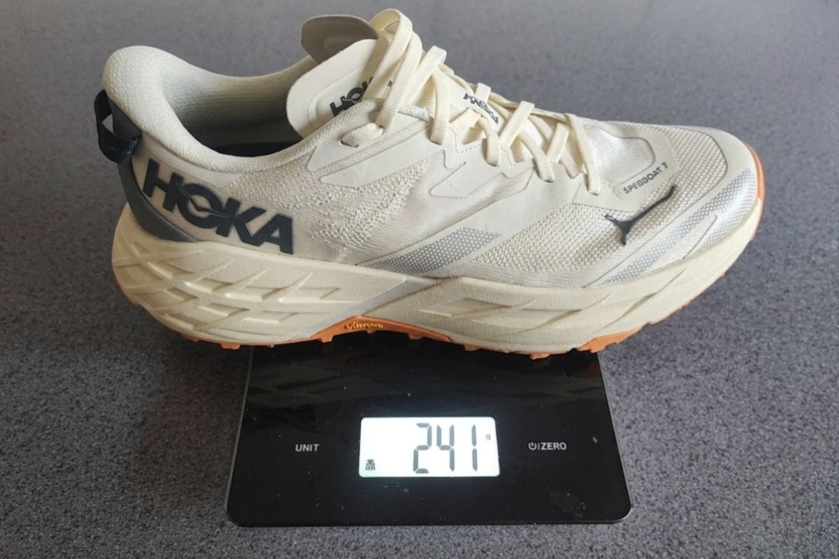 HOKA Speedgoat 7 women's US 9 Wide weighing 241 g on a digital scale