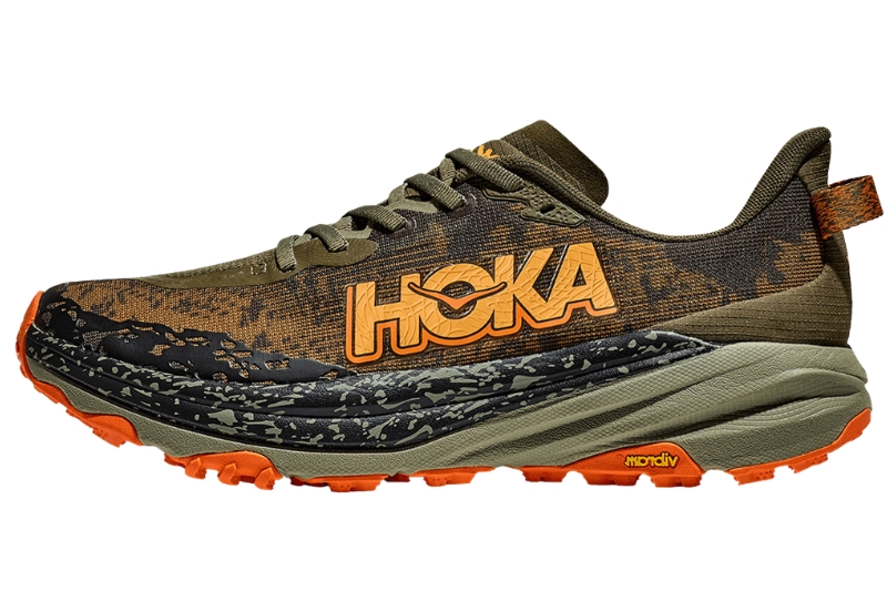 Hoka Speedgoat 6 in olive camo print with an orange logo and orange Vibram outsole, side view