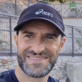 Sergio López Prieto, guest author on OutdoorAdept, smiling in a dark cap on Montserrat.