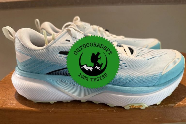 Side profile of the women's Brooks Cascadia 20 trail running shoe with the OutdoorAdept 100% Tested badge