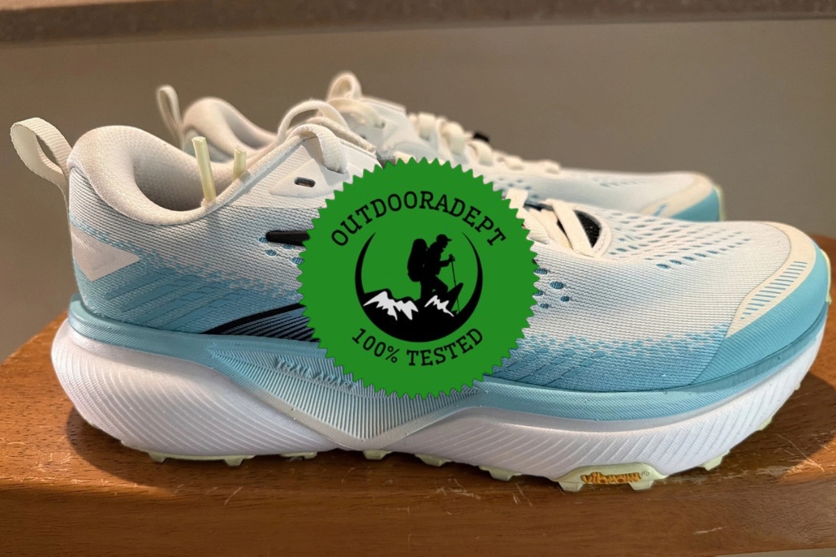Side profile of the women's Brooks Cascadia 20 trail running shoe with the OutdoorAdept 100% Tested badge