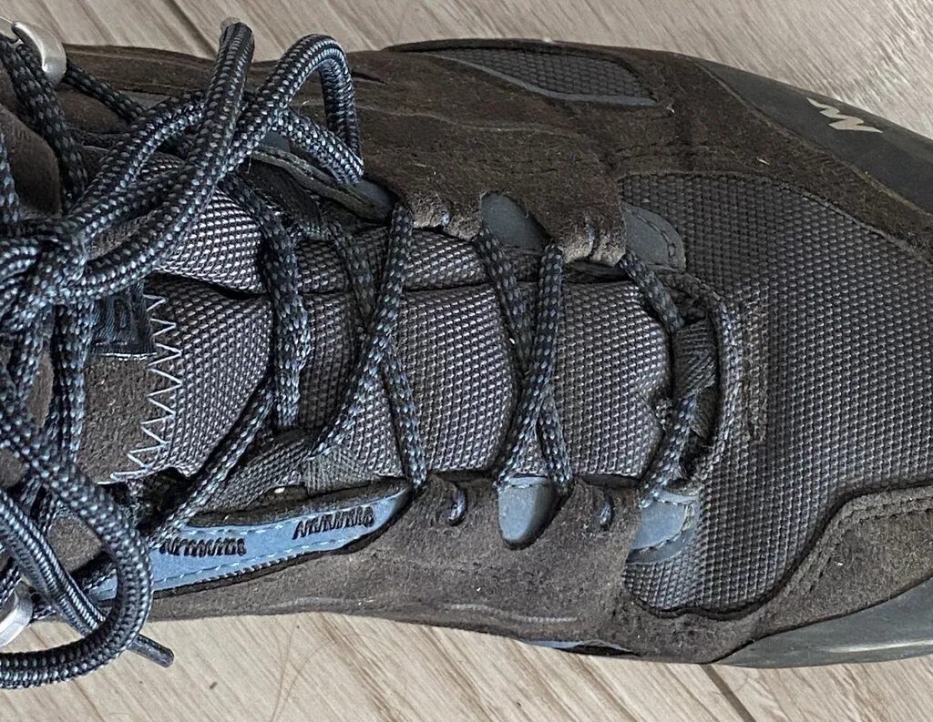 tie your hiking boots if they are too large