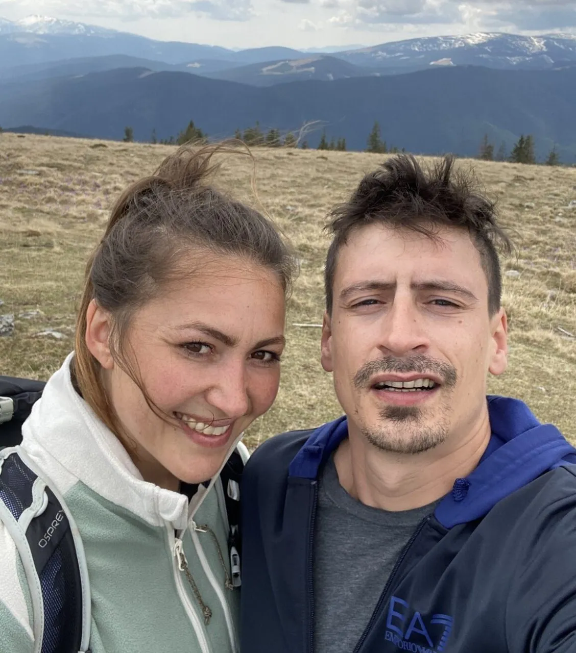 outdooradept catalin & christina with a mountain view on the background