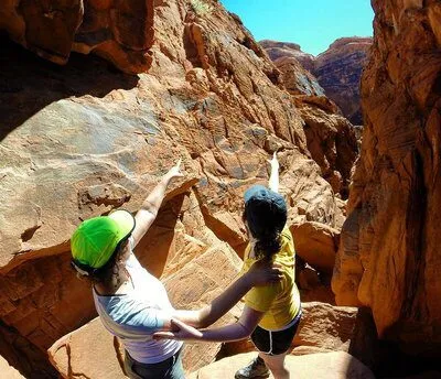 Two hikers debating if hiking is good for ankles