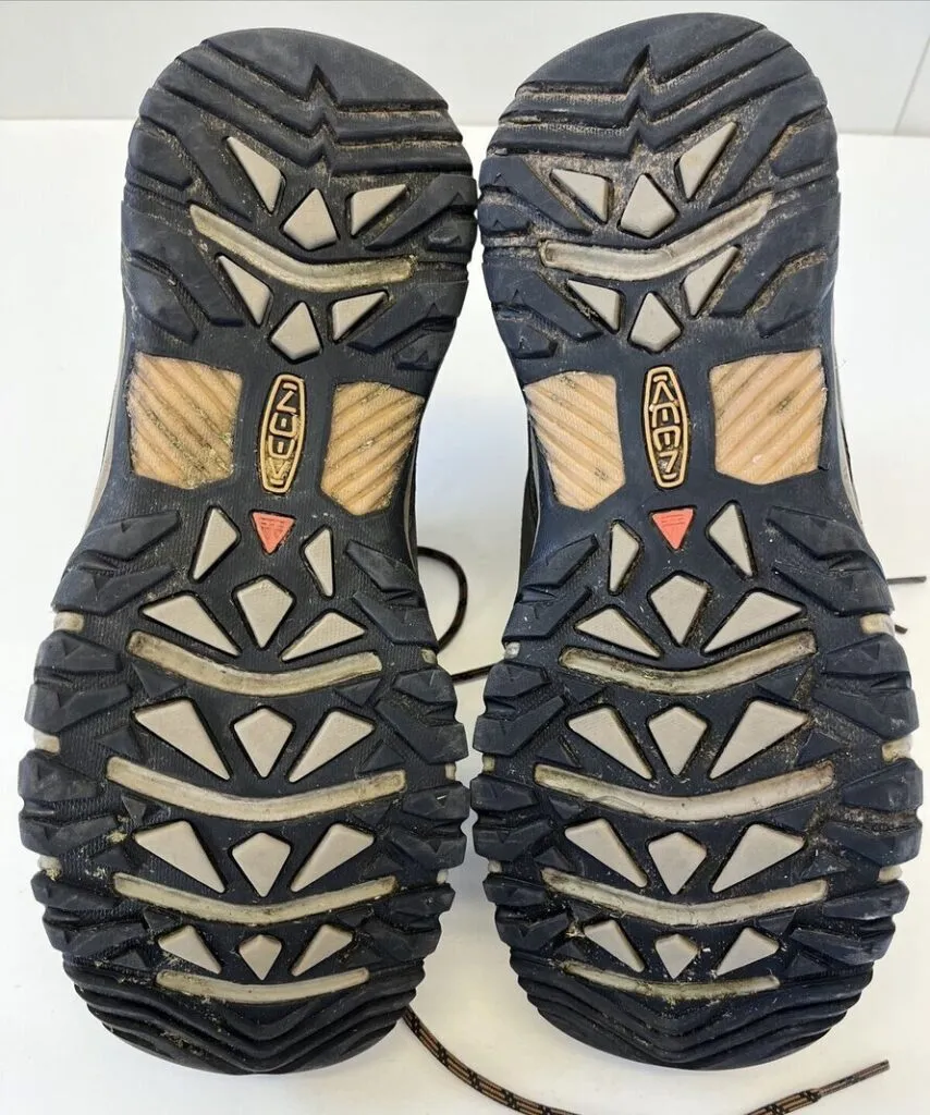 pair of keen taghee hiking boots showing the tread and traction