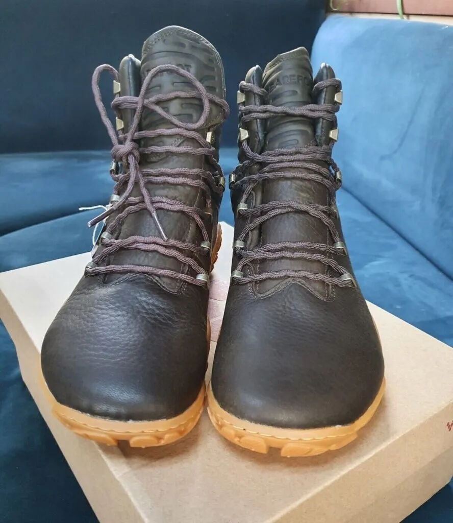 a pair of Vivobarefoot Tracker Forest Esc displayed on the box