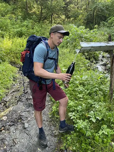 How to Purify Water on the Trail (8 Easy Ways) catalin geangos purifying Water while hiking on the trail