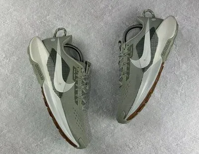 5 Best Waterproof Trail Running Shoes (Top Picks of 2026) Pegasus Trail 5 trail runners pair displayed on a gray surface